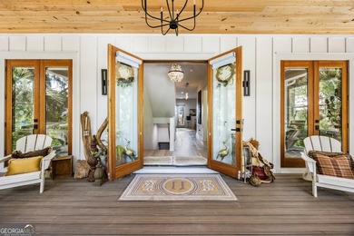 Welcome to an extraordinary waterfront retreat offering the - photo 8