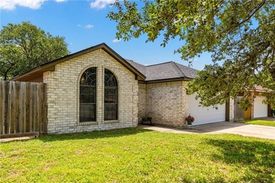 Welcome home to this well-maintained 3-bedroom, 2-bath residence - photo 3