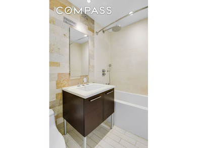 Beautifully designed modern 1 bedroom condominium with in-unit - photo 10