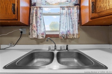 This charming home offers 3 bedrooms and 1 full bathroom