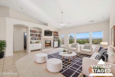 Tucked into the highly desirable Pinon Oaks subdivision, this