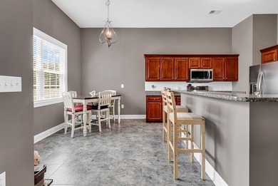 Welcome to this beautifully maintained custom-built home - photo 12