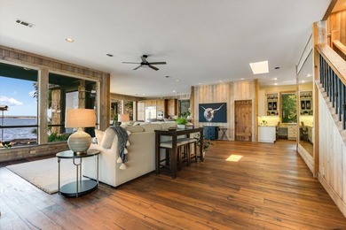 Beyond a gated entrance and beneath a canopy of mature live oaks - photo 10