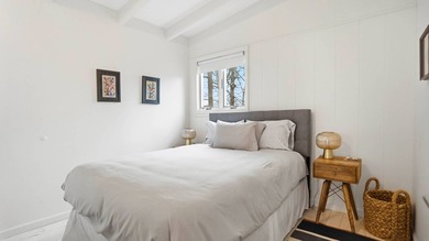 Freshly updated and effortlessly stylish, this Sag Harbor - photo 11