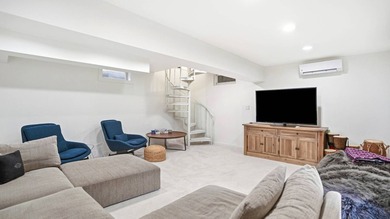 Freshly updated and effortlessly stylish, this Sag Harbor - photo 12