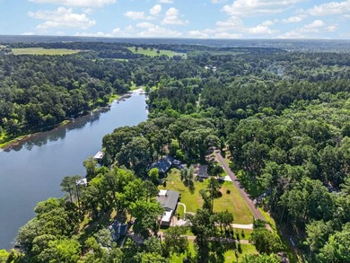 Nestled along the peaceful shores of Swan Lake, this beautifully - photo 44