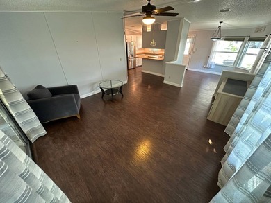 This well maintained and clean 2 bedroom 2 bath home is in - photo 13