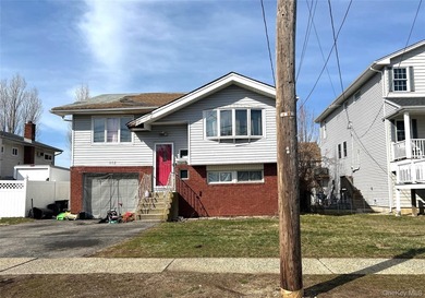 This Raised Ranch Home Features 3 Bedrooms, 2 Full Baths, Eat In - photo 2