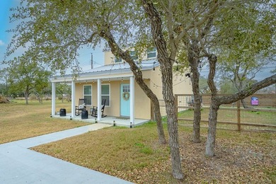 Nestled in the waterfront community of Holiday Beach, this - photo 5