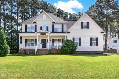 Welcome to 203 Wingate Drive, a spacious and inviting home - photo 1