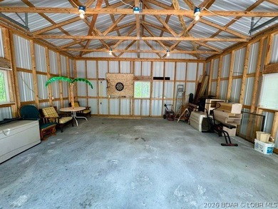 Experience the perfect lake retreat with this turn-key, fully - photo 16