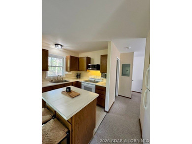 Experience the perfect lake retreat with this turn-key, fully - photo 21