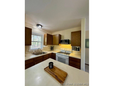 Experience the perfect lake retreat with this turn-key, fully - photo 23