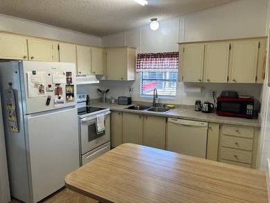 Located in the desirable Imperial Oaks 55+ community, this - photo 3