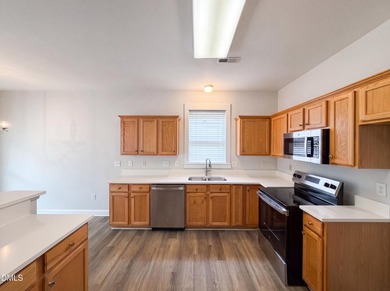 Welcome to this charming three-bedroom, two-and-a-half-bath - photo 2