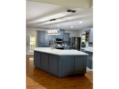Beautiful 4 Bedroom, 2 bath home with exceptional outdoor living - photo 7