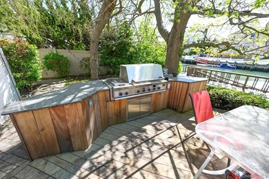 Experience the pinnacle of waterfront living at this spectacular - photo 15