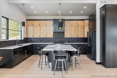 Stunning new modern home with breathtaking views located in Linn - photo 7