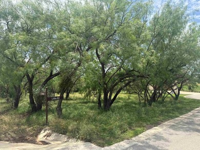 Exceptional corner lot nestled among mature trees in the - photo 1