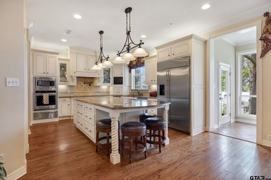 Exceptional waterfront living in Emerald Bay! This beautifully - photo 12