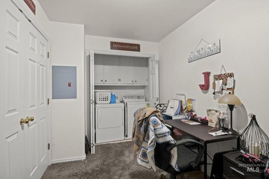 This top floor, three-bedroom, two bath condominium presents the