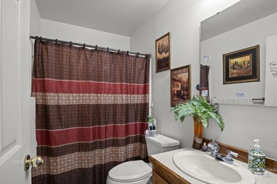 This top floor, three-bedroom, two bath condominium presents the