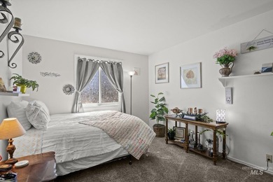 This top floor, three-bedroom, two bath condominium presents the