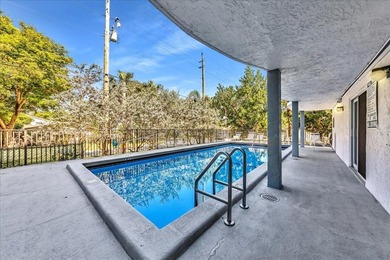 Rare FIRST FLOOR unit just steps away from the beach! You can - photo 19