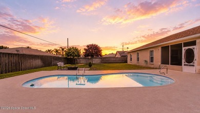 Tucked away in desirable NW Palm Bay, this spacious 3-bed - photo 3