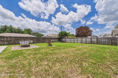 Tucked away in desirable NW Palm Bay, this spacious 3-bed - photo 6
