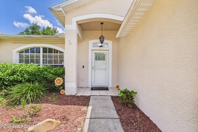 Tucked away in desirable NW Palm Bay, this spacious 3-bed - photo 7