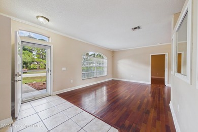 Tucked away in desirable NW Palm Bay, this spacious 3-bed - photo 8