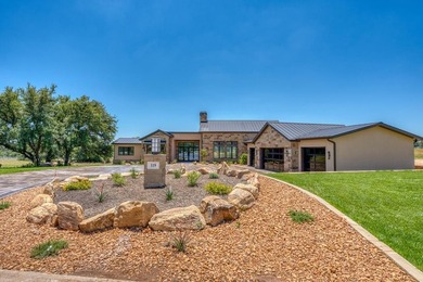 Experience luxury in this stunning new home situated on nearly - photo 2