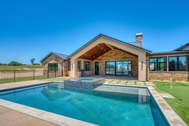 Experience luxury in this stunning new home situated on nearly - photo 3