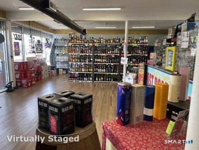 Liquor store for sale on busy Post Road with strong visibility - photo 1