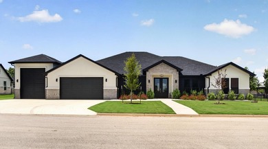 Welcome to this stunning 4-bedroom, 3-bathroom home in the gated - photo 2