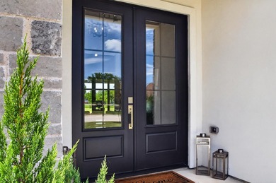 Welcome to this stunning 4-bedroom, 3-bathroom home in the gated - photo 4