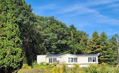 Discover an exceptional 58.9-acre property along the scenic - photo 3