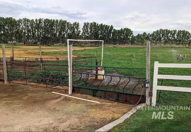 This well-maintained 3-bedroom, 2-bathroom brick home sits on 5