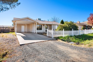 Welcome home to this charming ranch in the heart of Prescott