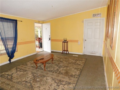 For Sale! This charming three-bedroom, two-bathroom home is