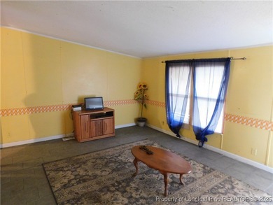 For Sale! This charming three-bedroom, two-bathroom home is