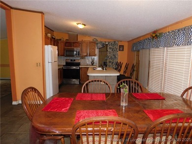 For Sale! This charming three-bedroom, two-bathroom home is