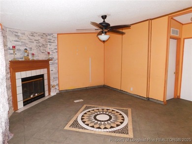 For Sale! This charming three-bedroom, two-bathroom home is