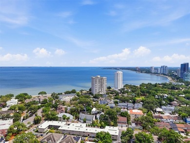 TOP-FLOOR UNIT! 2-story block construction condo built like a - photo 22