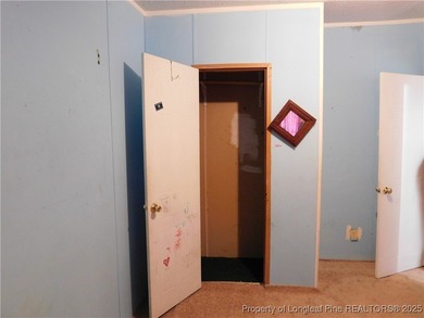 For Sale! This charming three-bedroom, two-bathroom home is