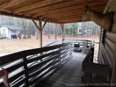 For Sale! This charming three-bedroom, two-bathroom home is