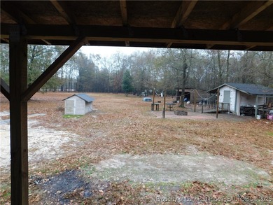For Sale! This charming three-bedroom, two-bathroom home is