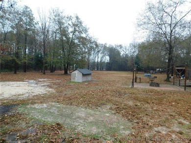 For Sale! This charming three-bedroom, two-bathroom home is
