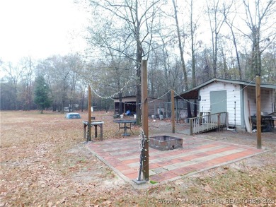 For Sale! This charming three-bedroom, two-bathroom home is